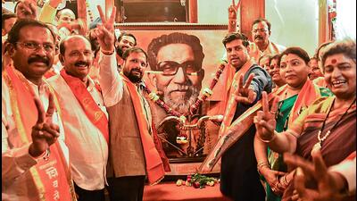 MP Shrikant Shinde with other Balasahebanchi Shiv Sena leaders and workers celebrates after the Election Commission of India recognised the party as real Shiv Sena, at party office Anand Ashram in Thane, on Friday. (PTI) MP Shrikant Shinde with other Balasahebanchi Shiv Sena leaders and workers celebrates after the Election Commission of India recognised the party as real Shiv Sena, at party office Anand Ashram in Thane, on Friday. (PTI)