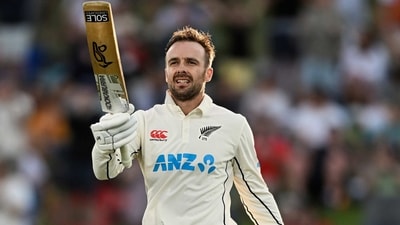 New Zealand's Tom Blundell celebrates making 100 runs against England on the second day of their cricket test match in Tauranga (AP) New Zealand's Tom Blundell celebrates making 100 runs against England on the second day of their cricket test match in Tauranga (AP)