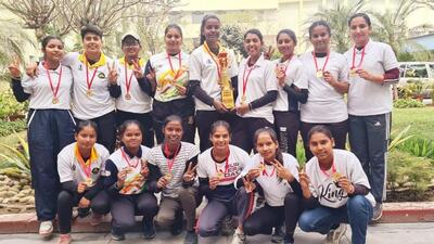 RGC Girls team posing with their Ludhiana district baseball championship medals. (HT File)