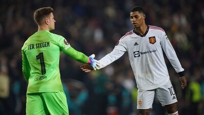 Manchester United's Marcus Rashford, right, and Barcelona's goalkeeper Marc-Andre ter Stegen shake hands after the end of the Europa League playoff first leg soccer match between Barcelona and Manchester United at the Camp Nou stadium in Barcelona, Spain, Thursday, Feb. 16, 2023. The game ended 2-2. (AP Photo/Joan Mateu Parra) (AP) Manchester United's Marcus Rashford, right, and Barcelona's goalkeeper Marc-Andre ter Stegen shake hands after the end of the Europa League playoff first leg soccer match between Barcelona and Manchester United at the Camp Nou stadium in Barcelona, Spain, Thursday, Feb. 16, 2023. The game ended 2-2. (AP Photo/Joan Mateu Parra) (AP)