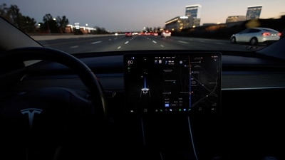 A Tesla Model 3 vehicle is shown driving using Full Self Driving (FSD) beta software. (REUTERS)