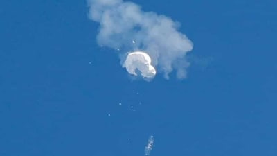 The suspected Chinese spy balloon drifts to the ocean after being shot down off the coast in Surfside Beach, South Carolina, US, on February 4. (REUTERS)