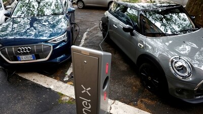 Electric cars are seen plugged in at a charging point. (Reuters/file) Electric cars are seen plugged in at a charging point. (Reuters/file)