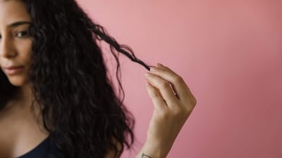 Tying it tightly: Wet hair is more elastic than dry hair, and pulling it into a tight ponytail or bun can cause breakage and weaken the strands. Instead, use a soft scrunchie or hair tie and keep your hairstyle loose. (Photo by RODNAE Productions on Pexels) Tying it tightly: Wet hair is more elastic than dry hair, and pulling it into a tight ponytail or bun can cause breakage and weaken the strands. Instead, use a soft scrunchie or hair tie and keep your hairstyle loose. (Photo by RODNAE Productions on Pexels)