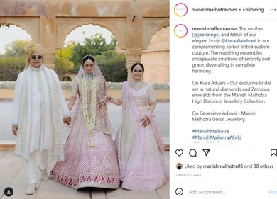 Kiara Advani walks with her parents at the wedding. Kiara Advani walks with her parents at the wedding.