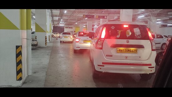While the Ola and Uber private taxi stands were shifted inside the newly started Aero Mall for the benefit of passengers, they are now causing traffic congestion and inconveniencing passengers no end. (HT PHOTO)
