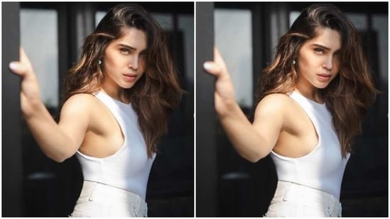 Sharvari picked a white tank top and tucked it inside her white denim distressed shorts as she posed for the sun kissed pictures.&nbsp;(Instagram/@sharvari)