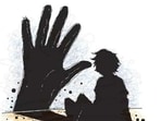 Police said that the woman and her son would heat a knife or tongs, and would brand the nine-year-old child with it. (FILE) Police said that the woman and her son would heat a knife or tongs, and would brand the nine-year-old child with it. (FILE)