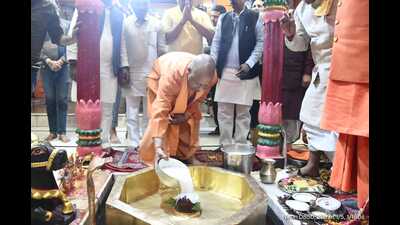 Chief minister Yogi Adityanath performing Rudra Abhishek of Lord Shiva at Gorakhnath temple in Gorakhpur on Saturday. (HT Photo)