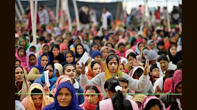 Devotees during the prayer meeting of Pastor Ankur Narula at his church in Khambra village of Jalandhar. (Ravi Kumar/ Hindustan Times)
