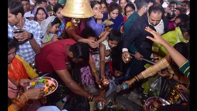 Devotees formed a beeline at various Shiva temples in the city early in the morning. (Anil Kumar Maurya) Devotees formed a beeline at various Shiva temples in the city early in the morning. (Anil Kumar Maurya)