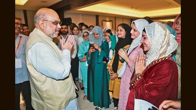 During his visit, Amit Shah met the children of Kashmir Police personnel who lost their lives in the line of duty. (HT PHOTO) During his visit, Amit Shah met the children of Kashmir Police personnel who lost their lives in the line of duty. (HT PHOTO)