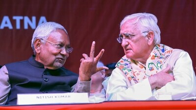 Nitish Kumar and Salman Khurshid at the 11th CPIML Party Congress in Patna on Saturday. (PTI)
