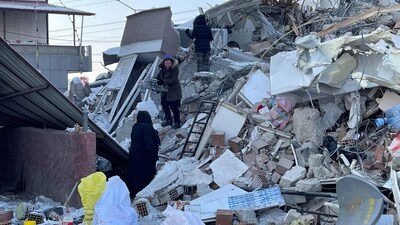 People search for their belongings among rubble, in the aftermath of the deadly earthquake, in Turkey. (REUTERS)