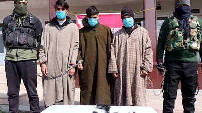 The arrested terror associates of banned outfit Hizbul Mujahideen in Kulgam police custody on Saturday. (ANI) The arrested terror associates of banned outfit Hizbul Mujahideen in Kulgam police custody on Saturday. (ANI)
