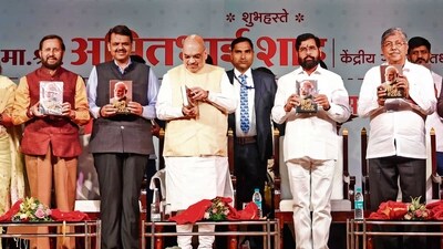 The book launch event was attended by senior BJP leaders Shah and Fadnavis and Maharashtra CM Eknath Shinde. (RAHUL RAUT/ HT PHOTO) The book launch event was attended by senior BJP leaders Shah and Fadnavis and Maharashtra CM Eknath Shinde. (RAHUL RAUT/ HT PHOTO)