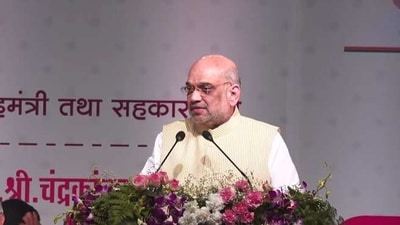 Union home minister Amit Shah in Pune releasing the Marathi translation of Modi@20 book. Union home minister Amit Shah in Pune releasing the Marathi translation of Modi@20 book.