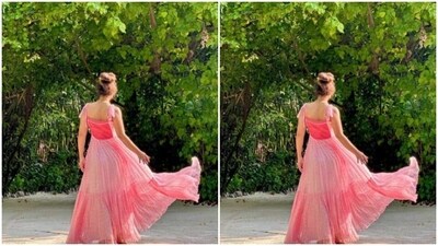Hina played muse to fashion designer house Kalakaari by Sagarika Singhvi and picked a pastel pink cotton dress as she posed in the beach for the photoshoot. (Instagram/@realhinakhan) Hina played muse to fashion designer house Kalakaari by Sagarika Singhvi and picked a pastel pink cotton dress as she posed in the beach for the photoshoot. (Instagram/@realhinakhan)