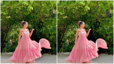 Hina’s slip dress featured a plunging sweetheart neckline, corset patterns and long flowy tiered skirt details below the waist. (Instagram/@realhinakhan) Hina’s slip dress featured a plunging sweetheart neckline, corset patterns and long flowy tiered skirt details below the waist. (Instagram/@realhinakhan)