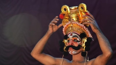 A “Yakshagana” artist prepares prior to a performance in a theatre in Bangalore. (Manjunath Kiran / AFP) A “Yakshagana” artist prepares prior to a performance in a theatre in Bangalore. (Manjunath Kiran / AFP)