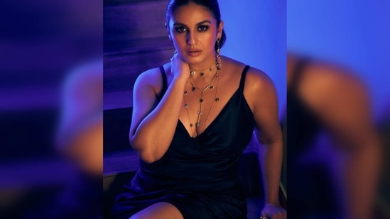 Huma Qureshi turns up the glam quotient in a black satin dress featuring straps and a slit that goes up to her thighs.&nbsp;(Instagram/@iamhumaq)