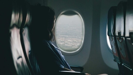 Protect your ears while travelling on an aeroplane. Use yawning or chewing aids for maintaining good ear pressure.(Unsplash)
