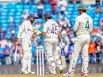 Ravindra Jadeja, left, greets India's captain Rohit Sharma during a Test match
