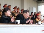 Kim Jong Un Daughter: North Korean leader Kim Jong Un and his daughter watching a sports event. Kim Jong Un Daughter: North Korean leader Kim Jong Un and his daughter watching a sports event.