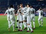 Soccer Football - LaLiga - Osasuna v Real Madrid - El Sadar Stadium, Pamplona, Spain - February 18, 2023 Real Madrid's Marco Asensio celebrates scoring their second goal with teammate Vinicius Junior REUTERS/Vincent West