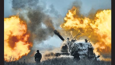 A self-propelled artillery vehicle fires on the frontline, Donetsk region, Ukraine, February 18, 2023 (AP)