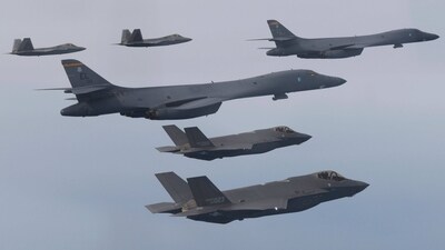 U.S. Air Force B-1B bombers, center, F-22 fighter jets and South Korean Air Force F-35 fighter jets, bottom, fly over South Korea Peninsula during a joint air drill in South Korea, (AP) U.S. Air Force B-1B bombers, center, F-22 fighter jets and South Korean Air Force F-35 fighter jets, bottom, fly over South Korea Peninsula during a joint air drill in South Korea, (AP)