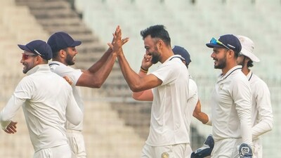 Kolkata: Saurashtra's captain Jaydev Unadkat celebrates with teammates after the wicket of Bengal's batter Manoj Tiwary during the 4th day of Ranji Trophy final cricket match between Bengal and Saurashtra, at Eden Gardens in Kolkata, Sunday, Feb. 19, 2023. (PTI Photo/Swapan Mahapatra)(PTI02_19_2023_000020B) (PTI) Kolkata: Saurashtra's captain Jaydev Unadkat celebrates with teammates after the wicket of Bengal's batter Manoj Tiwary during the 4th day of Ranji Trophy final cricket match between Bengal and Saurashtra, at Eden Gardens in Kolkata, Sunday, Feb. 19, 2023. (PTI Photo/Swapan Mahapatra)(PTI02_19_2023_000020B) (PTI)