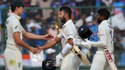 Indian batters Cheteshwar Pujara and Srikar Bharat greet Australian captain Pat Cummins after the end of the 2nd test cricket match between India and Australia, at the Arun Jaitley Stadium, in New Delhi. (PTI) Indian batters Cheteshwar Pujara and Srikar Bharat greet Australian captain Pat Cummins after the end of the 2nd test cricket match between India and Australia, at the Arun Jaitley Stadium, in New Delhi. (PTI)