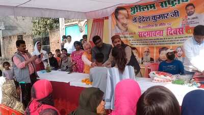 Stationary items being distributed among kids in Prayagraj on Sunday. (HT Photo)