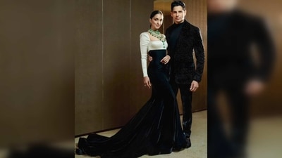 Sidharth Malhotra complemented his gorgeous bride in a shimmery black suit and turtleneck.&nbsp; (Instagram/@manishmalhotra)