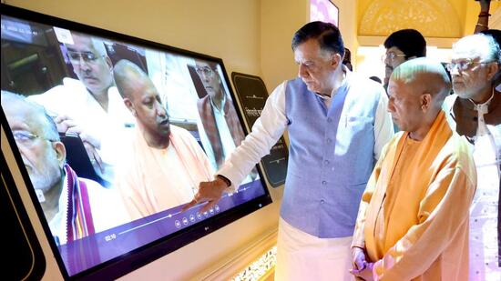 Uttar Pradesh chief minister Yogi Adityanath and state assembly speaker Satish Mahana at the inauguration of the digital gallery in Lucknow on Sunday. (Deepak Gupta/HT PHOTO)