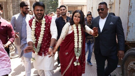 Fahad Ahmad and Swara Bhasker on their way out of the court.