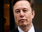 FILE PHOTO: Tesla CEO Elon Musk and his security detail depart the company’s local office in Washington, U.S. January 27, 2023.  REUTERS/Jonathan Ernst/File Photo