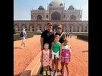 David Warner and his family posing for the camera. 