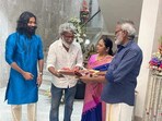 Dhanush with his parents at their new home in Chennai.