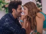 Kartik Aaryan and Kriti Sanon in a still from Shehzada. Kartik Aaryan and Kriti Sanon in a still from Shehzada.