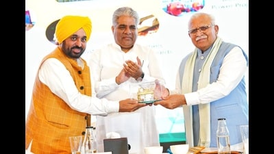Chief minister Bhagwant Mann , Union minister Bhupender Yadav and Haryana CM Manohar Lal Khattar during an event in Mohali. (HT photo) Chief minister Bhagwant Mann , Union minister Bhupender Yadav and Haryana CM Manohar Lal Khattar during an event in Mohali. (HT photo)