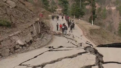 Cracks & damage to roads in Ramban, 13 houses damaged due to landslides. (ANI) Cracks & damage to roads in Ramban, 13 houses damaged due to landslides. (ANI)