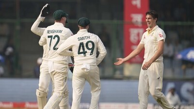 Australia's captain Pat Cummins, right, celebrates with teammates the dismissal of India's Ravichandran Ashwin (AP) Australia's captain Pat Cummins, right, celebrates with teammates the dismissal of India's Ravichandran Ashwin (AP)