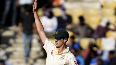 Australia's captain Pat Cummins directs teammates to their fielding positions (AP) Australia's captain Pat Cummins directs teammates to their fielding positions (AP)