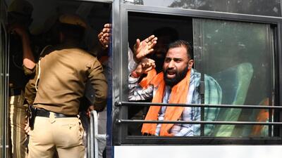 Police personnel detain activists from a Hindu outfit outside the JNU campus on Monday. (Vipin Kumar/ht photo) Police personnel detain activists from a Hindu outfit outside the JNU campus on Monday. (Vipin Kumar/ht photo)