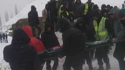 Tajikistan Avalanches: People take part in a rescue operation following an avalanche slide in Gorno-Badakhshan region, Tajikistan. (Reuters)