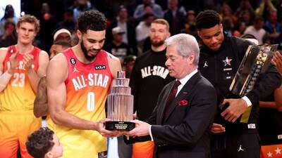 Jayson Tatum #0 of the Boston Celtics receives The Kobe Bryant MVP Trophy from Russell Wager, vice-president of marketing for KIA North America, after the 2023 NBA All Star Game between Team Giannis and Team LeBron at Vivint Arena. (Getty Images via AFP) Jayson Tatum #0 of the Boston Celtics receives The Kobe Bryant MVP Trophy from Russell Wager, vice-president of marketing for KIA North America, after the 2023 NBA All Star Game between Team Giannis and Team LeBron at Vivint Arena. (Getty Images via AFP)