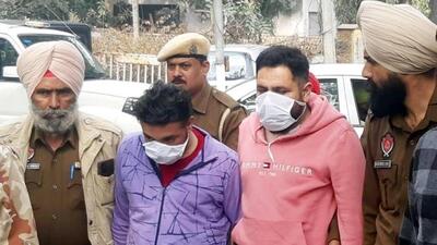 The accused in the police custody in Amritsar on Monday. (Sameer Sehgal/HT)