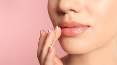 Use a tinted lip balm: Instead of applying lipstick and lip balm separately, use a tinted lip balm that can moisturize your lips while adding a pop of color. (Shutterstock) Use a tinted lip balm: Instead of applying lipstick and lip balm separately, use a tinted lip balm that can moisturize your lips while adding a pop of color. (Shutterstock)